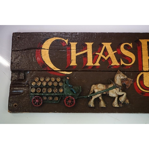 115 - A Chas Bate & Son hand painted wooden brewery sign, measures approx 183cm in length.