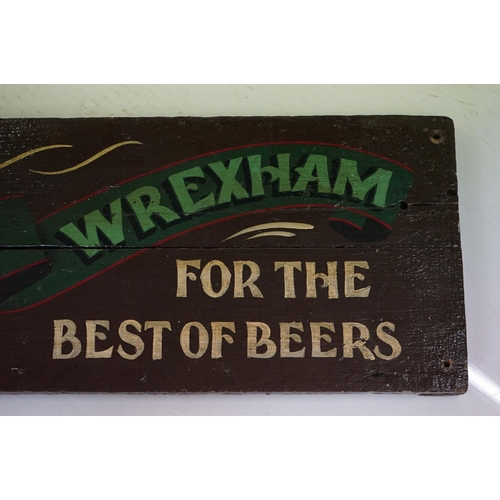 115 - A Chas Bate & Son hand painted wooden brewery sign, measures approx 183cm in length.