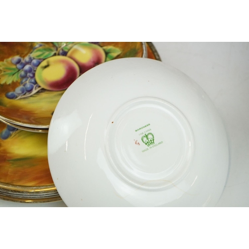 51 - Baroness china dinner service featuring painted peach and grape motifs and gilt rims. Signed A Mello... 