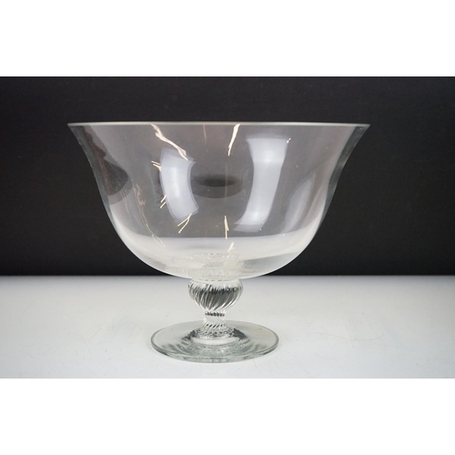 52A - Dartington glass - a footed centre-piece bowl having a fluted knopped stem with a flared rim. Measur... 