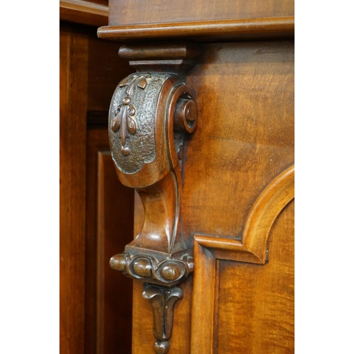 591 - Victorian Mahogany Double Wardrobe, the two panel doors opening to a hanging space with rail and peg... 