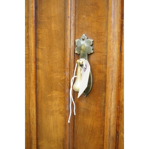 591 - Victorian Mahogany Double Wardrobe, the two panel doors opening to a hanging space with rail and peg... 