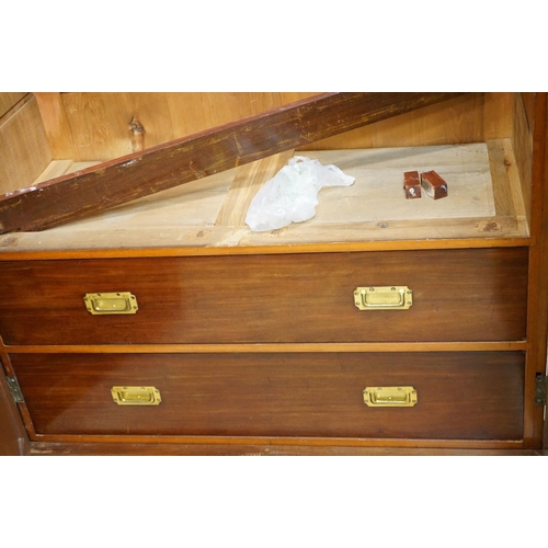 591 - Victorian Mahogany Double Wardrobe, the two panel doors opening to a hanging space with rail and peg... 