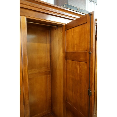 592 - Large Victorian style Mahogany Triple Hall Cupboard or Wardrobe, two panel doors opening to a hangin... 