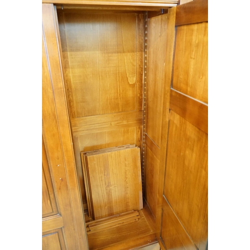 592 - Large Victorian style Mahogany Triple Hall Cupboard or Wardrobe, two panel doors opening to a hangin... 