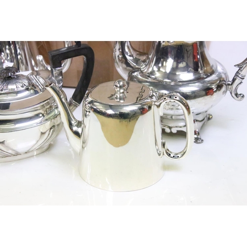 435 - A matched four piece tea set, a coffee pot and Alten hollow ware