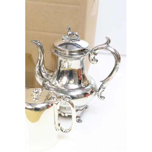 435 - A matched four piece tea set, a coffee pot and Alten hollow ware