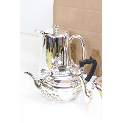 435 - A matched four piece tea set, a coffee pot and Alten hollow ware