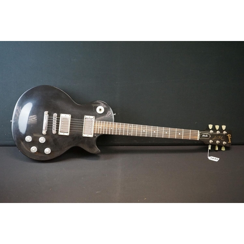 1045 - Guitar - A Gibson Les Paul Studio electric guitar in black finish.