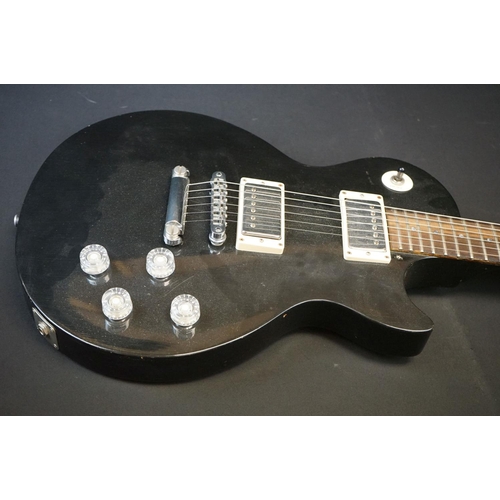 1045 - Guitar - A Gibson Les Paul Studio electric guitar in black finish.