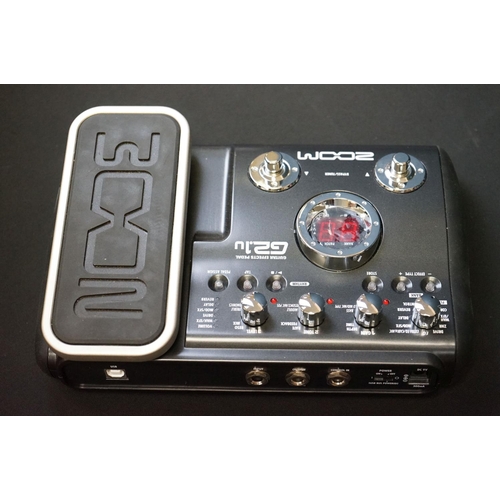 1049 - Two guitar pedals to include a Zoom G2 1u, and a M-Audio SP-2.  Both with original boxes