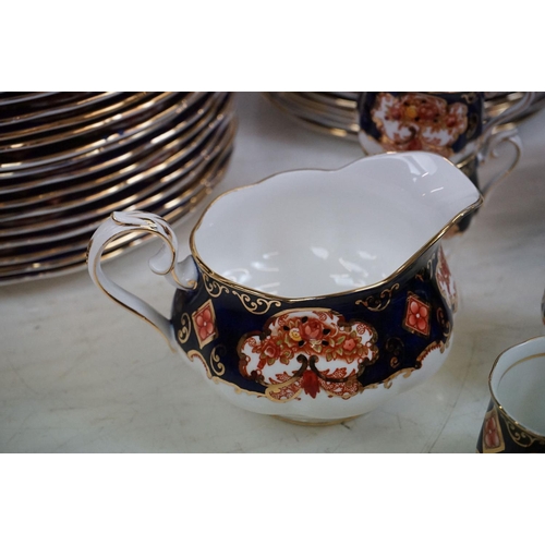 89 - Royal Albert Heirloom pattern extensive tea and dinner service. The lot to include approximately; te... 