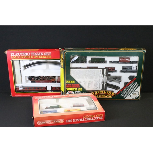 56 - Three boxed Hornby OO gauge electric train sets to include R697 LMS Express Passenger with Duchess o... 