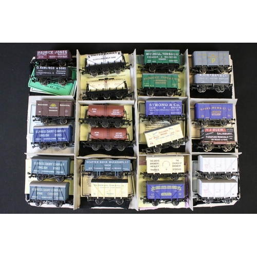 57 - Around 75 OO gauge items of rolling stock mainly featuring Wessex Wagons ltd edn examples, many with... 