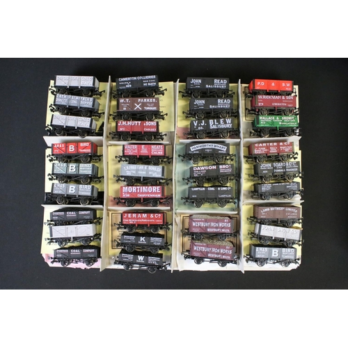 57 - Around 75 OO gauge items of rolling stock mainly featuring Wessex Wagons ltd edn examples, many with... 