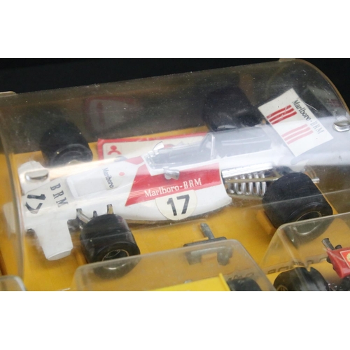 1162 - 13 Cased Polistil / Politoys Formula 1 diecast models to include FX3 Lotus J.P.S., FX4 B.R.M. Marlbo... 