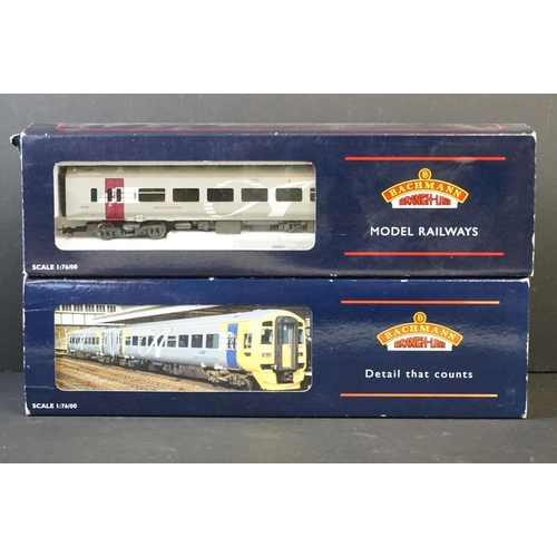 18 - Two boxed Bachmann OO gauge DMU sets to include 31506 158 Car DMU Wales and West and 31506A 158 2 Ca... 