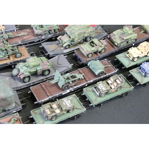 64 - 25 OO gauge items of military rolling stock to include ltd edn Wolf Wagons and Bachmann examples plu... 