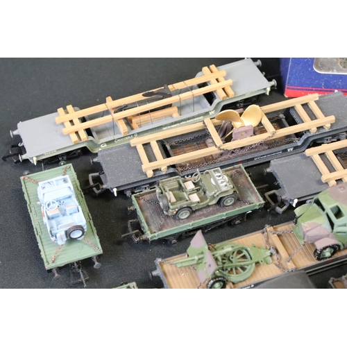 64 - 25 OO gauge items of military rolling stock to include ltd edn Wolf Wagons and Bachmann examples plu... 