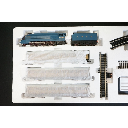 121 - Two boxed Hornby OO gauge electric train sets to include R1171 Flight of The Mallard and R1144 Night... 