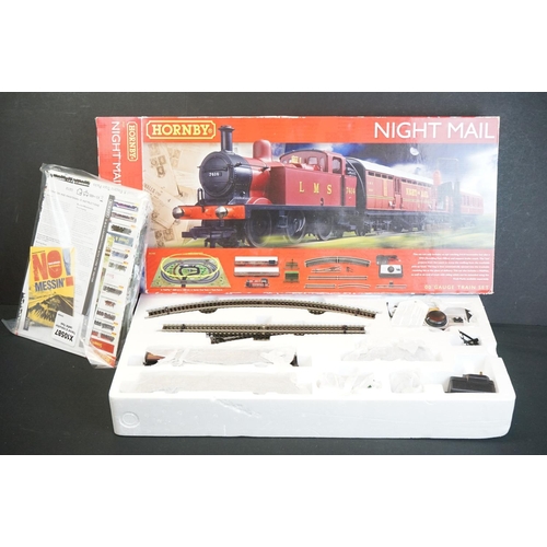 121 - Two boxed Hornby OO gauge electric train sets to include R1171 Flight of The Mallard and R1144 Night... 