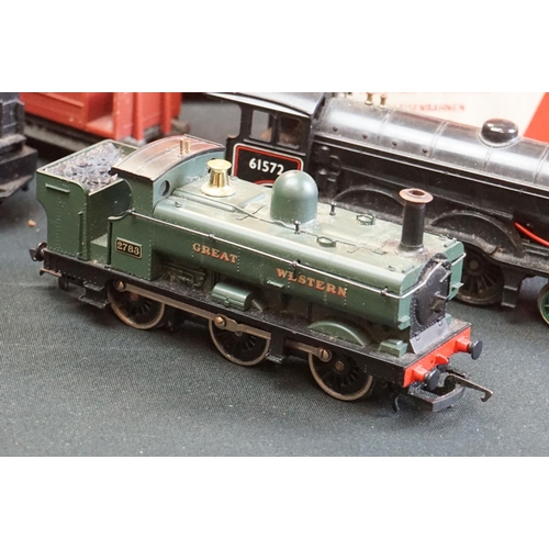 124 - Quantity of OO gauge model railway to include 3 x locomotives, 6 x boxed items of rolling stock, 10 ... 