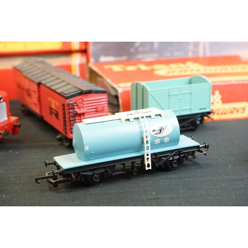 124 - Quantity of OO gauge model railway to include 3 x locomotives, 6 x boxed items of rolling stock, 10 ... 