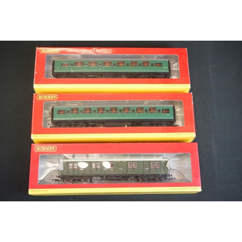 59 - 29 Boxed Hornby OO gauge items of rolling stock to include R4302B, R4306B, R4320A, R4165, R4164 etc