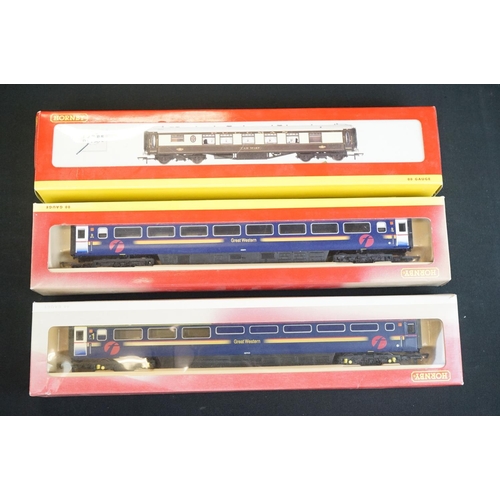 59 - 29 Boxed Hornby OO gauge items of rolling stock to include R4302B, R4306B, R4320A, R4165, R4164 etc