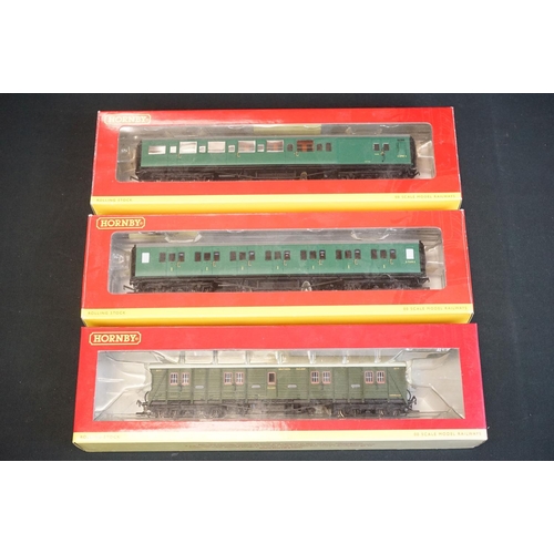 59 - 29 Boxed Hornby OO gauge items of rolling stock to include R4302B, R4306B, R4320A, R4165, R4164 etc