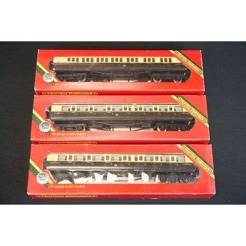 59 - 29 Boxed Hornby OO gauge items of rolling stock to include R4302B, R4306B, R4320A, R4165, R4164 etc