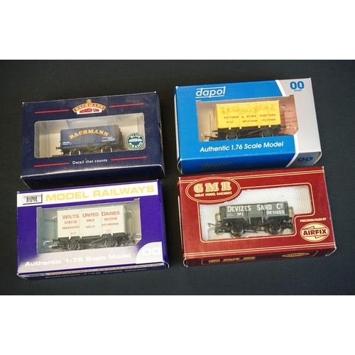 61 - 27 Boxed OO gauge items of rolling stock to include 15 x Dapol, 4 x Hornby, 6 x Bachmann, 1 x Palito... 