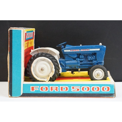 1328 - Boxed Britains 9527 Ford 5000 Tractor diecast model (diecast vg but heavy repair to wheels) plus 2 x... 