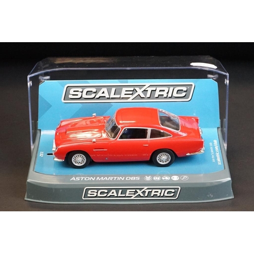 263 - Three cased Scalextric slot cars to include C3722 Aston Martin DB5 red, C3730 Jaguar D Type Nurburgr... 