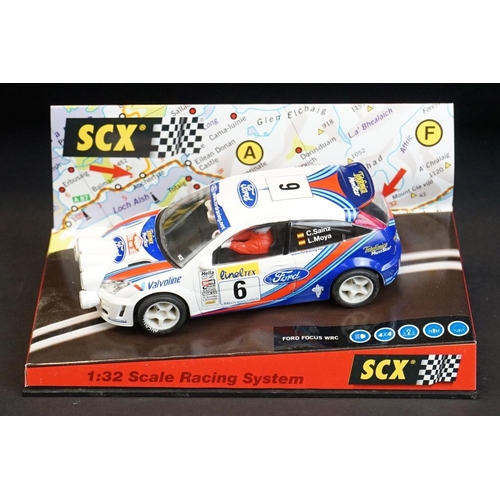 273 - Six cased SCX 1:32 Scale Racing System slot cars to include 60740 Citroen Xsara WRC 