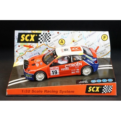 273 - Six cased SCX 1:32 Scale Racing System slot cars to include 60740 Citroen Xsara WRC 