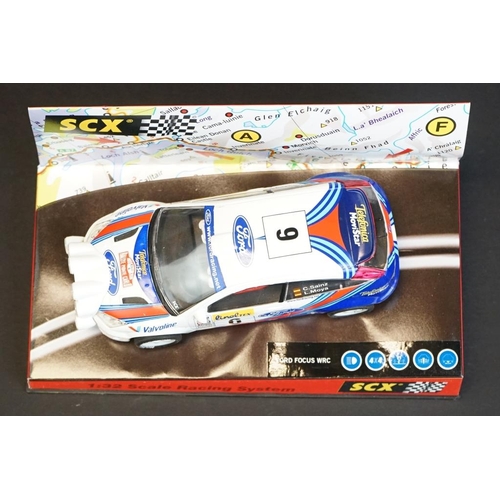 273 - Six cased SCX 1:32 Scale Racing System slot cars to include 60740 Citroen Xsara WRC 