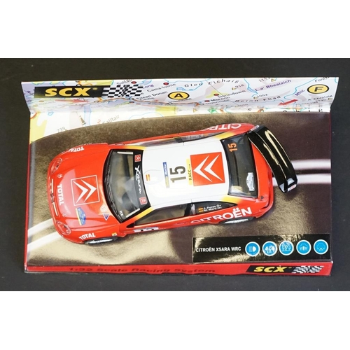 273 - Six cased SCX 1:32 Scale Racing System slot cars to include 60740 Citroen Xsara WRC 