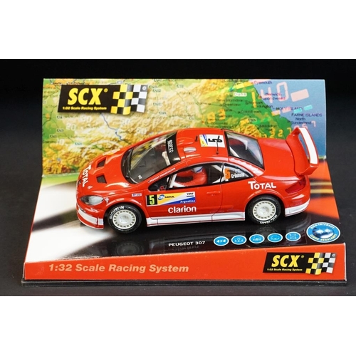 273 - Six cased SCX 1:32 Scale Racing System slot cars to include 60740 Citroen Xsara WRC 