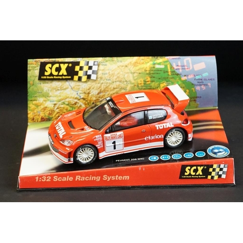 274 - Six cased SCX 1:32 Scale Racing System slot cars, to include 60010 Mitsubishi Lancer 