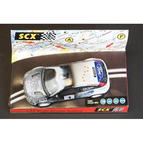 274 - Six cased SCX 1:32 Scale Racing System slot cars, to include 60010 Mitsubishi Lancer 