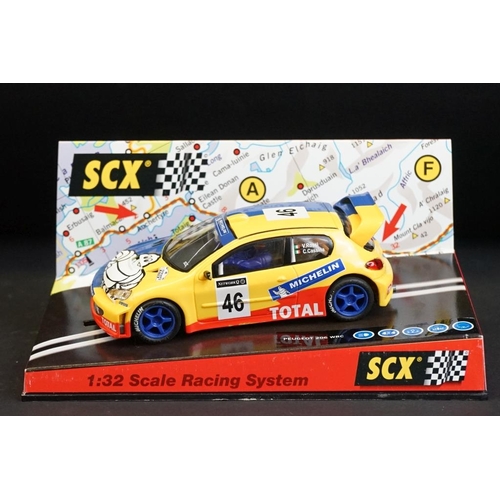 274 - Six cased SCX 1:32 Scale Racing System slot cars, to include 60010 Mitsubishi Lancer 