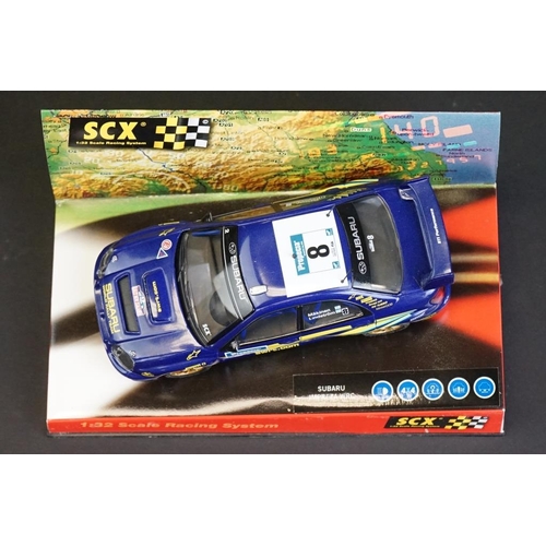 274 - Six cased SCX 1:32 Scale Racing System slot cars, to include 60010 Mitsubishi Lancer 