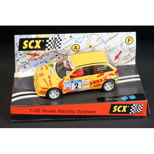 274 - Six cased SCX 1:32 Scale Racing System slot cars, to include 60010 Mitsubishi Lancer 