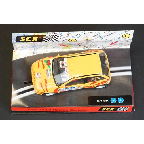 274 - Six cased SCX 1:32 Scale Racing System slot cars, to include 60010 Mitsubishi Lancer 