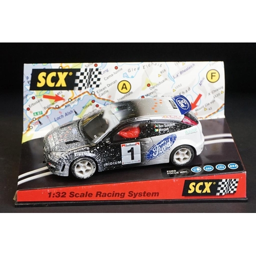 274 - Six cased SCX 1:32 Scale Racing System slot cars, to include 60010 Mitsubishi Lancer 