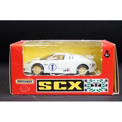 275 - Seven boxed Matchbox SCX slot cars to include Volvo 850T (83920.20), Bugatti (83870.20 - missing win... 