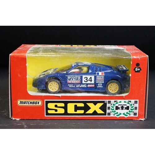 275 - Seven boxed Matchbox SCX slot cars to include Volvo 850T (83920.20), Bugatti (83870.20 - missing win... 