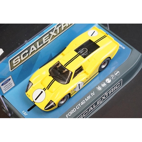 276 - Four cased Scalextric slot cars to include Special Edition C3746A MGB Thoroughbred Sports Car Series... 