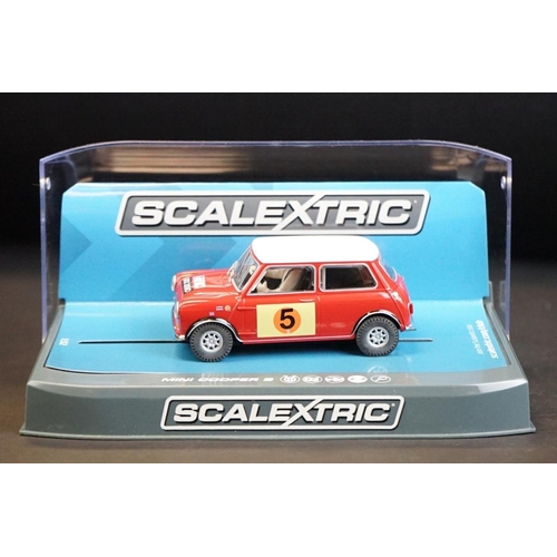 278 - Four cased Scalextric slot cars to include C2920 Ford Escort RS 1600 No 1, C3612 Chevrolet Camaro 19... 